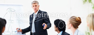 Business man giving training to his colleagues