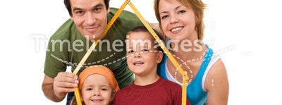 Happy family with their kids - real estate concept
