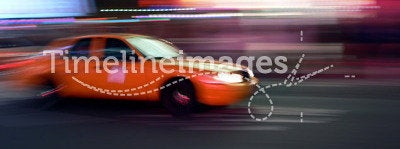 Taxi speeds through the streets