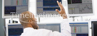 Stock Trader Talking Animatedly On The Phone