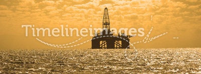 Oil rig during sunset in Caspi