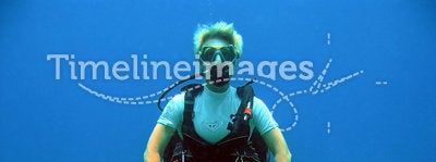 Diver weightless underwater