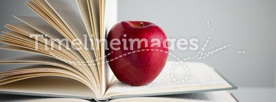 Red apple on books