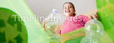 Girl recycling plastic bottles