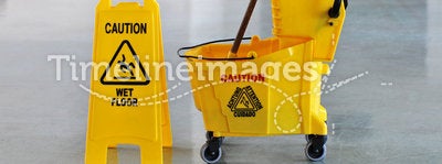 Mop, Bucket and Caution Wet Floor