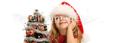 Little girl dreaming about christmas