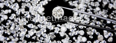 Diamond In Tweezers