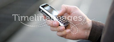 Cellular Phone in Hand