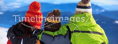 Children on snowy mountain