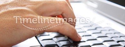Hand On Computer Keyboard