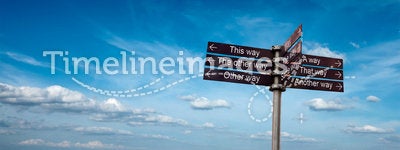 Signpost in sky
