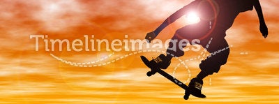 Teen Boy Silhouette With Skateboard Jumping At Sunset