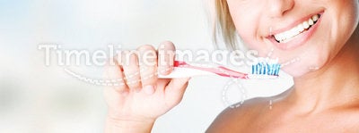 Beautiful Girl Brushing her teeth