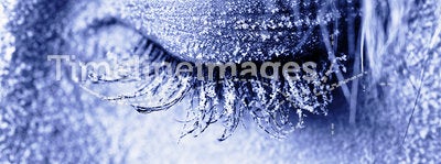 Frozen woman's eye covered in frost