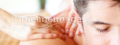 Attractive man having a back massage