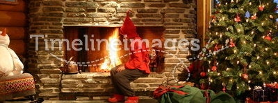 Santa's helper making fire
