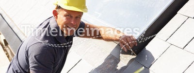 Roofer Working On Exterior