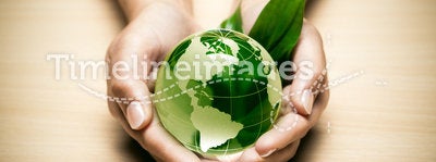 Hands with eco World globe