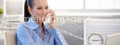 Happy office worker girl on phone call. Happy office worker girl on landline phone call, smiling, listening to conversation