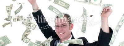 Attractive Business Man In Suit Throwing Money Into Air