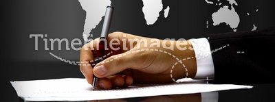 Businessman's hand with pen