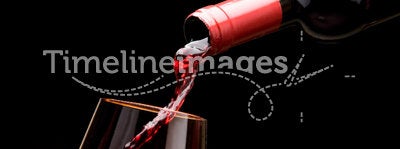 Pouring wine by the fireplace