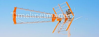 TV antenna against volcano in Santorini