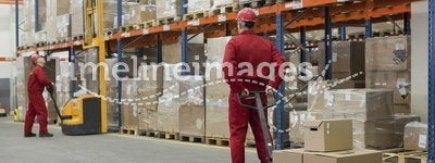 Logistic - workers in storehouse