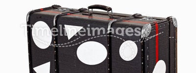 Old Used Suitcase With blank Travel Stickers