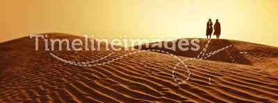 Couple in sahara desert