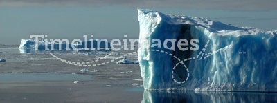 Two blue Antarctic icebergs