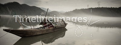 Wooden boat on river