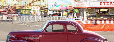 Vintage car and carnival