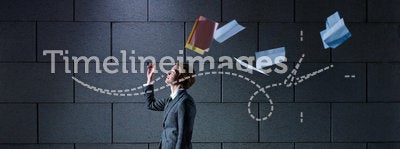 Businessman throwing away files and documents