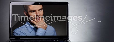 Man on the screen of a laptop