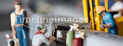 Miniature Artisans Doing Maintenance