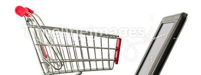 Shopping cart over a laptop