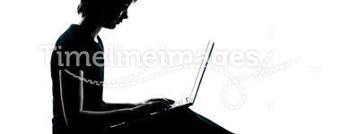 One young teenager silhouette computer computing