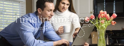 Couple with laptop.