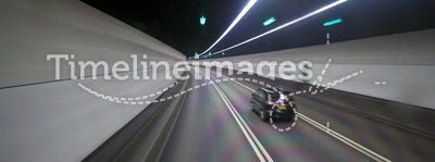 Tunnel and moving cars in Hong Kong
