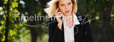 Fashion business woman calling on cell phone