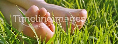 Bare feet in the grass