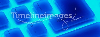 Fragment of blue backlit flexible keyboard