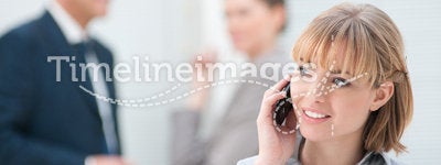 Happy young lady at phone