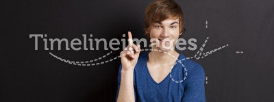 Young man over a chalk board