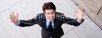 Young professional businessman with arms open