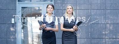 Two young and attractive businesswomen