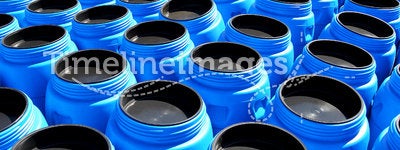 The blue plastic barrels for chemicals