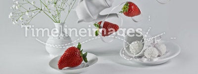 Flying strawberries with white ribbon.