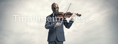 Businessman with gas mask, plays the violin